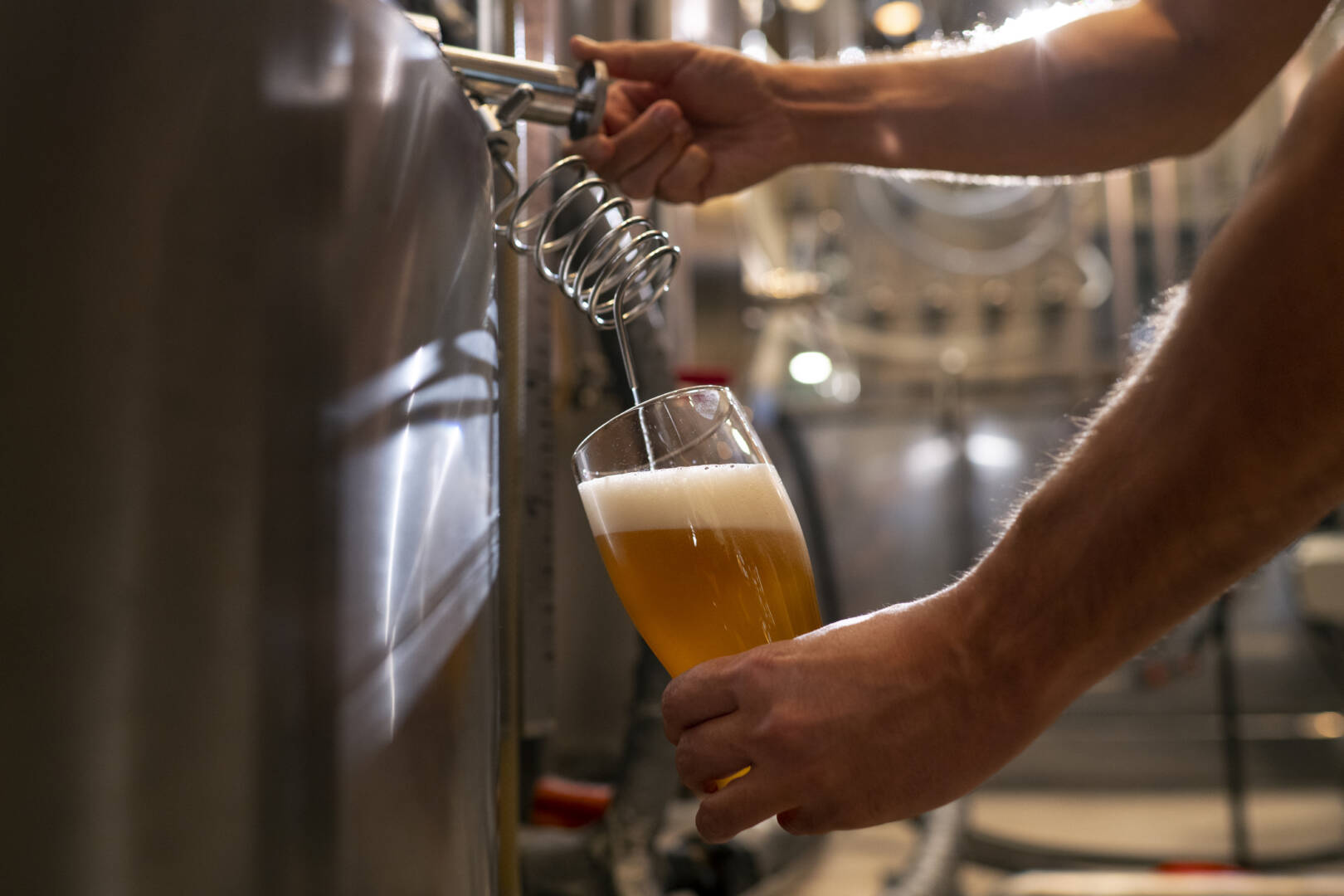 side-view-man-working-beer-factory